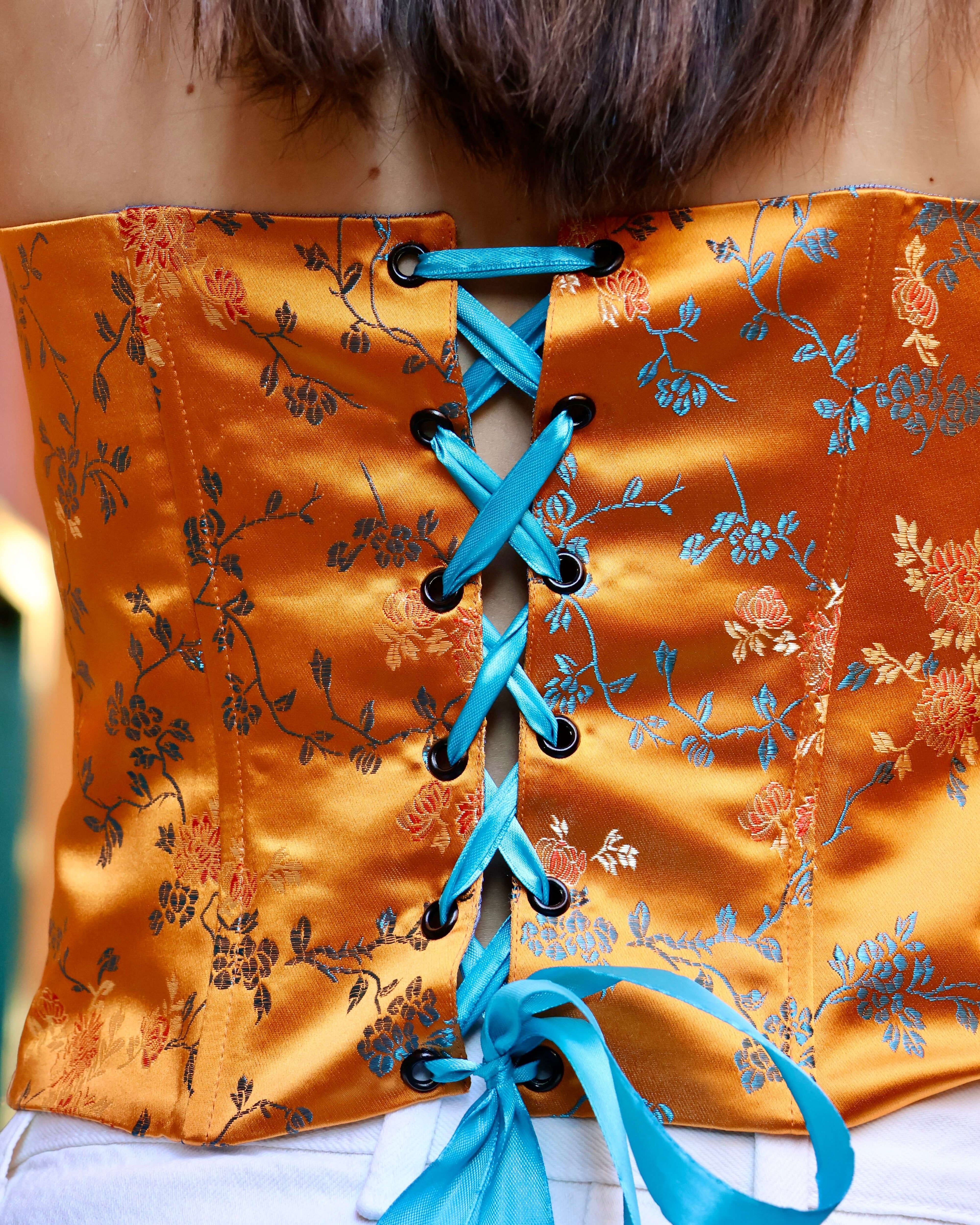 dettaglio corsetto tessuto cinese