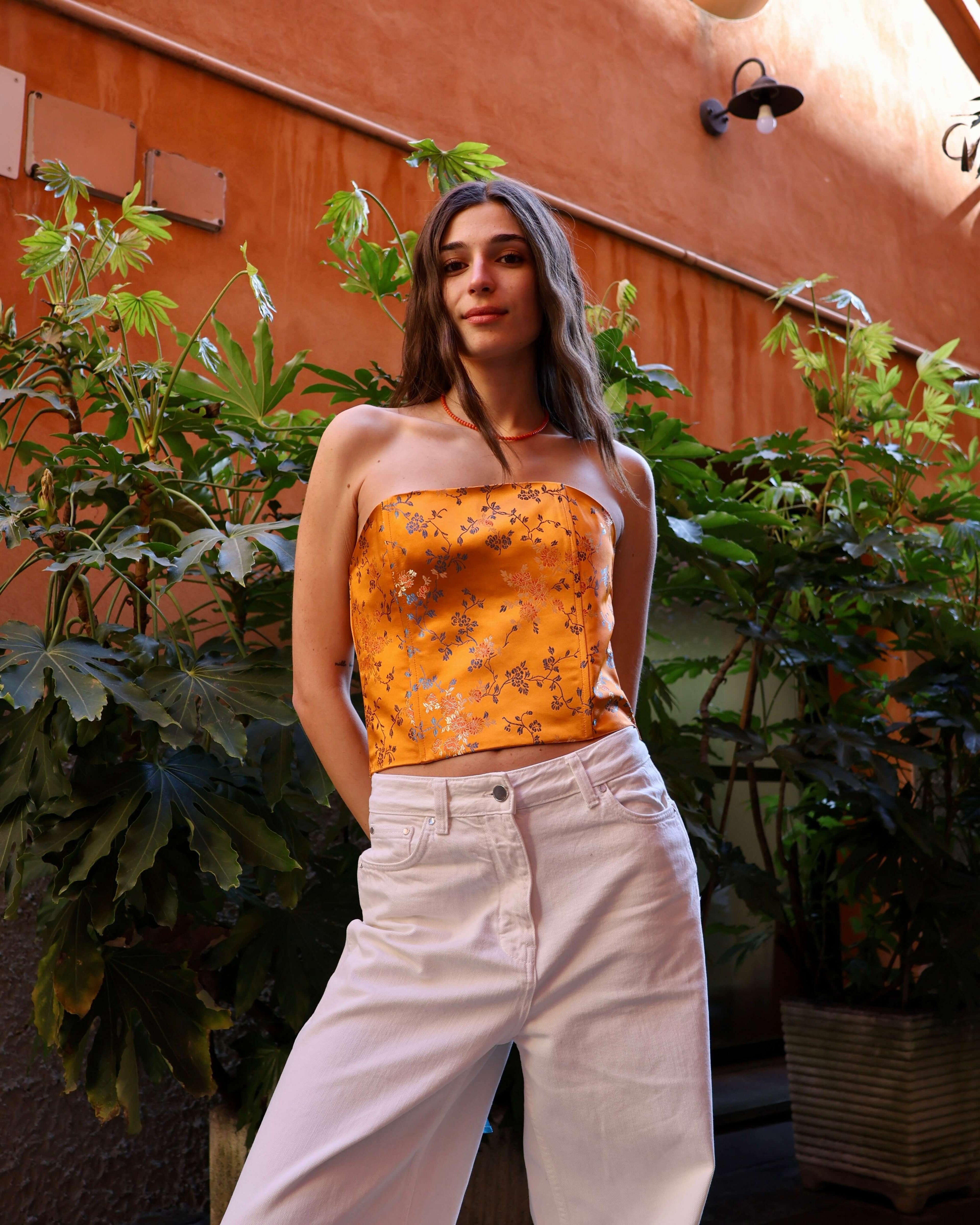 corsetto elegante outfit sera con pantaloni palazzo
