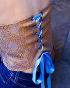 chiusura corsetto regolabile a nastro dettaglio